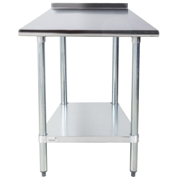 An Advance Tabco stainless steel work table with a shelf.