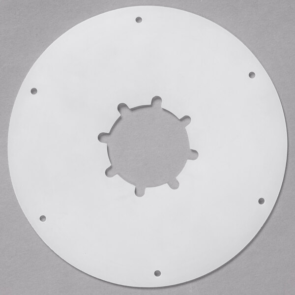 A white circular Carlisle cup dispenser gasket with holes.
