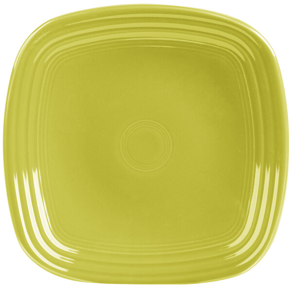 A close-up of a Fiesta® lemongrass square luncheon plate with a circle in the center.