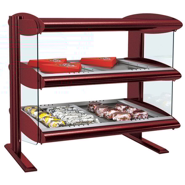 A red Hatco countertop heated display case with food on it.