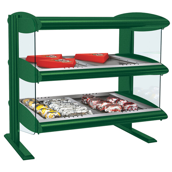 A green Hatco countertop heated zone merchandiser with food on it.