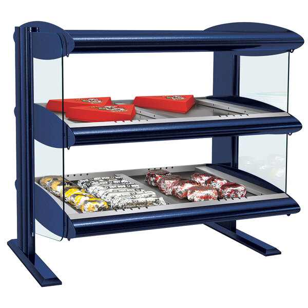 A blue Hatco countertop heated zone display case with food on it.