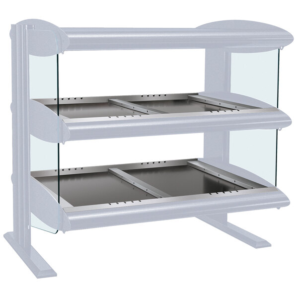 A white Hatco countertop heated zone shelf with trays on it.