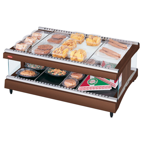 A Hatco countertop heated glass display case with food on it.