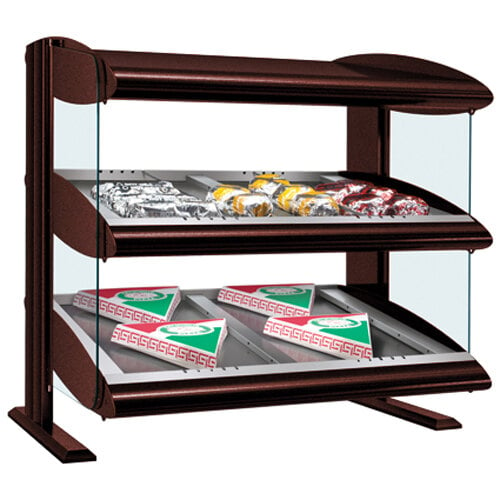 A Hatco slanted double shelf heated zone merchandiser with food inside.