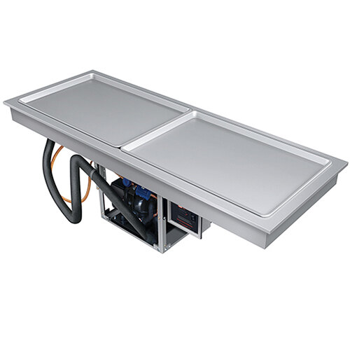 A Hatco stainless steel drop in frost top on a metal table with trays.