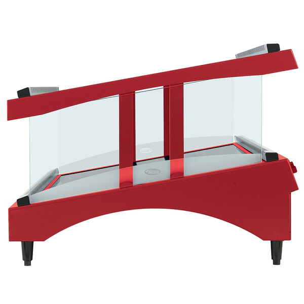A red Hatco countertop display warmer with a glass shelf.