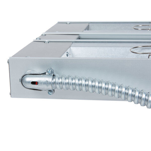 A metal box with a flexible hose attached to it.