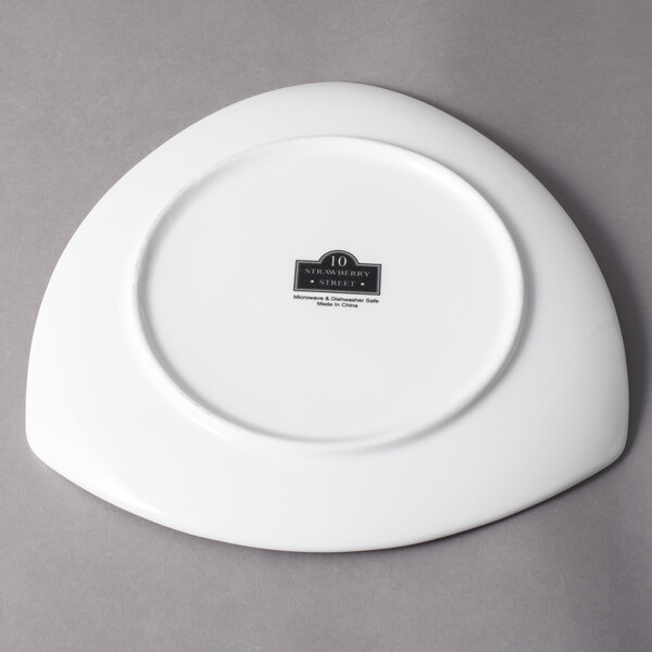 A white 10 Strawberry Street triangle porcelain plate.