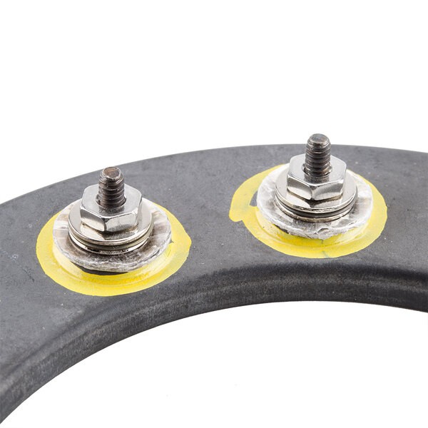 A Nemco heating element with two bolts and a yellow circle.