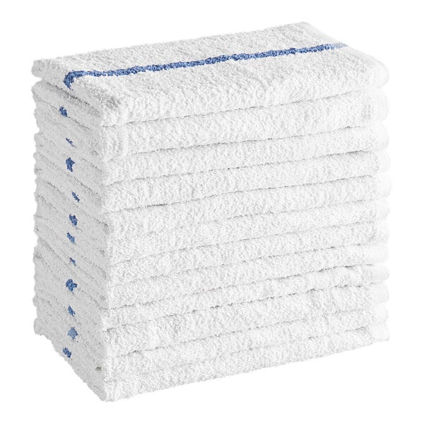 A stack of twelve white towels with a blue stripe along the edge.