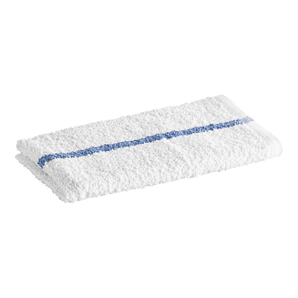 A folded white towel with a single blue stripe running lengthwise across it.