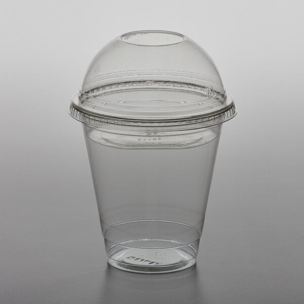 A clear plastic Parfait cup with a clear dome lid.