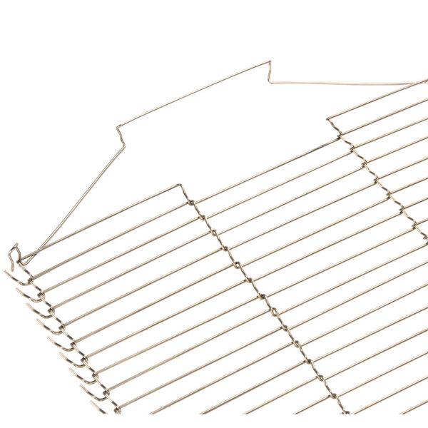 A close-up of the wire mesh belt on a Waring conveyor toaster.