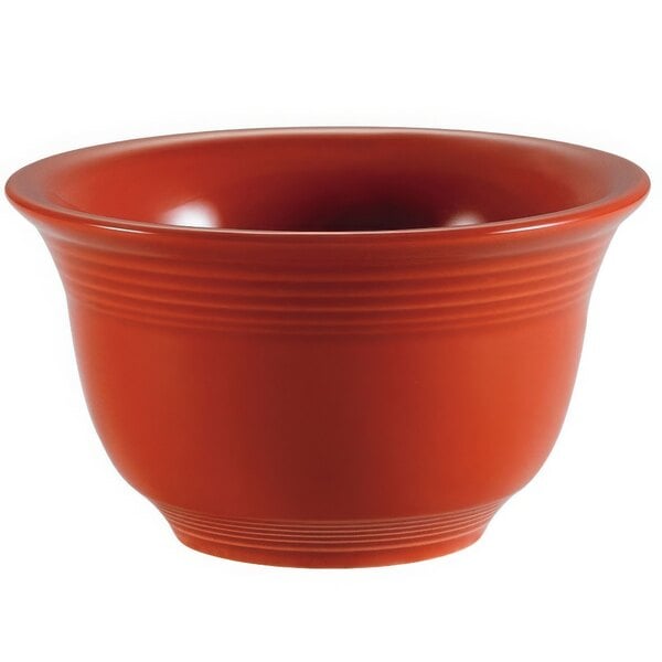 A close up of a red CAC Tango bouillon bowl with a handle.