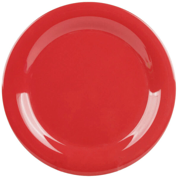 A close-up of a red GET Cranberry Diamond Harvest narrow rim plate.