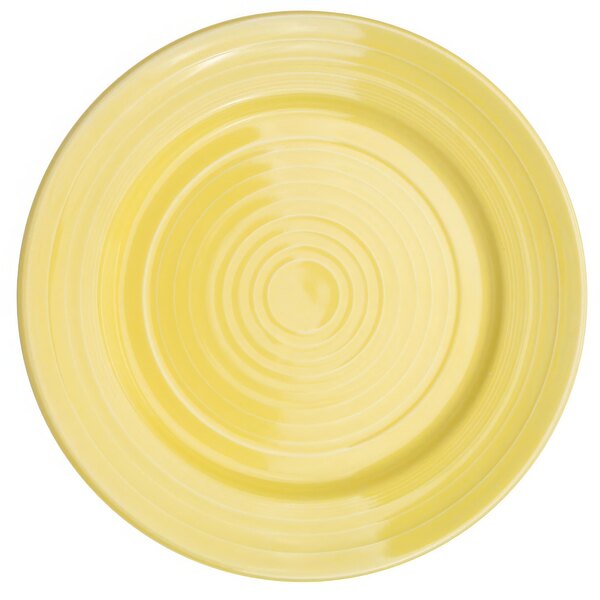 A yellow plate with a sunflower pattern.