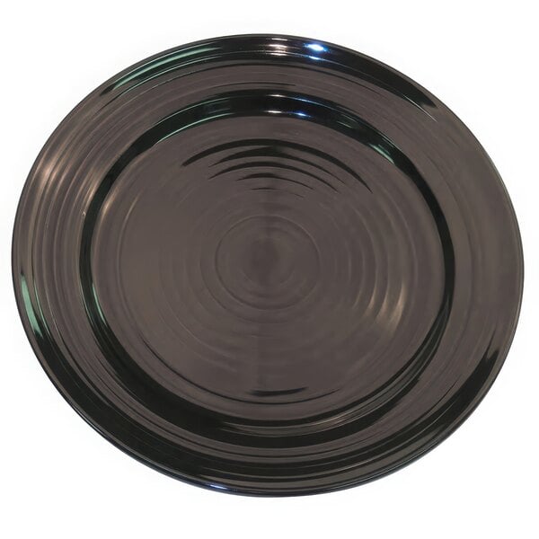 A close up of a black CAC Tango round plate with a circular rim.