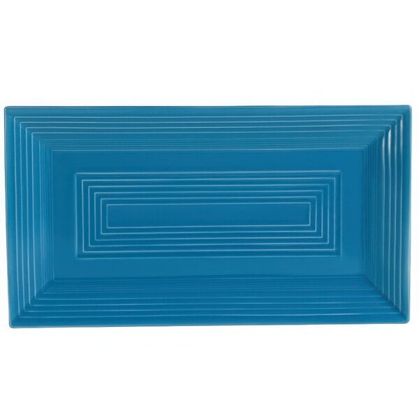 A blue rectangular platter with white lines.