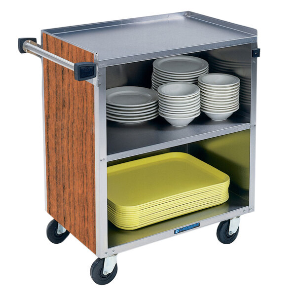 A Lakeside stainless steel utility cart with plates and bowls on it.