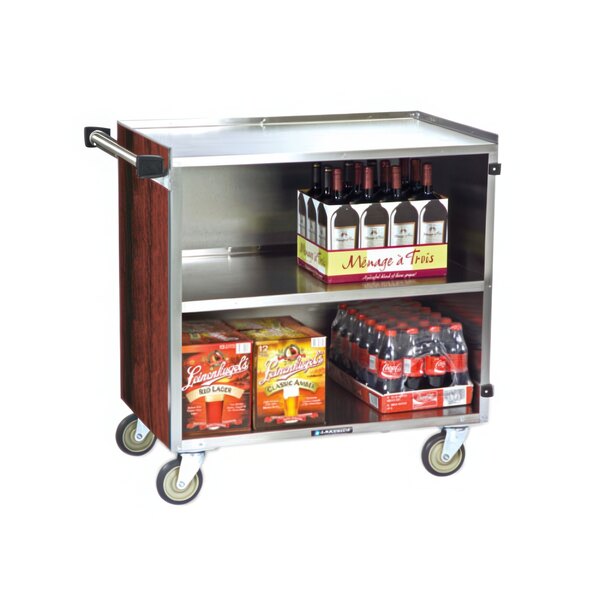 A Lakeside stainless steel utility cart with bottles of wine and beverages.