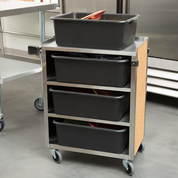 A Lakeside stainless steel utility cart with black bins on it.