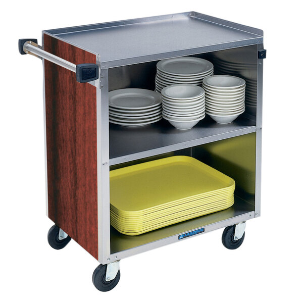 A Lakeside stainless steel utility cart with plates on it.