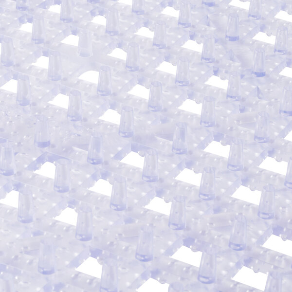 A close up of a clear plastic grid.