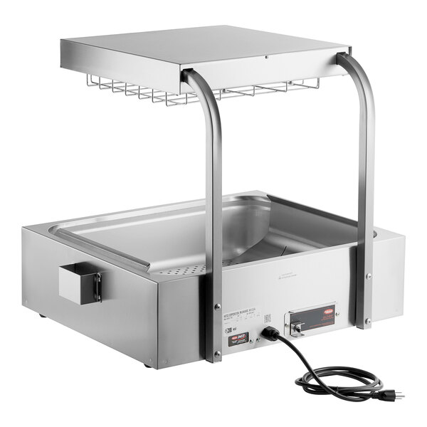 A silver stainless steel Hatco fry holding station with a metal wire rack on a counter.