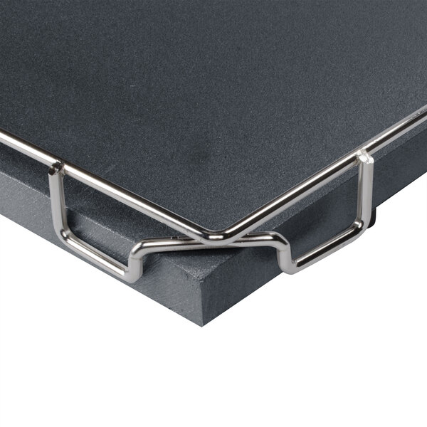 A Hatco portable food warmer with a black heated surface on a table.