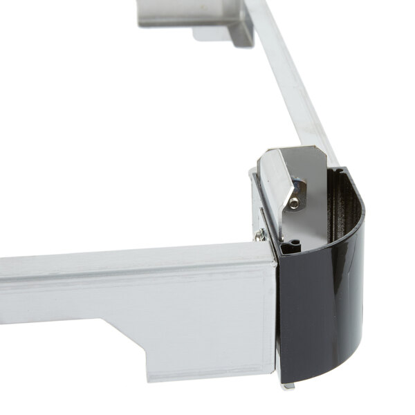 A metal frame with a black and silver APW Wyott Stacking Kit bracket on it.