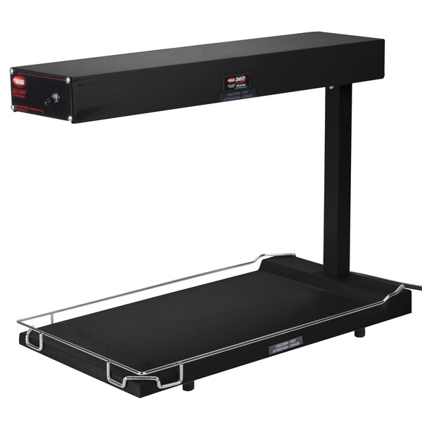 A black rectangular Hatco food warmer with a metal frame.