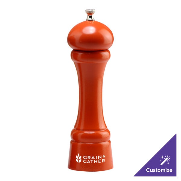 A Chef Specialties Butternut Orange pepper mill on a counter.