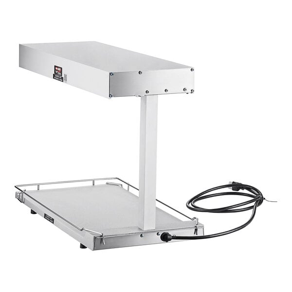 A silver metal Hatco heated shelf with a wire attached.