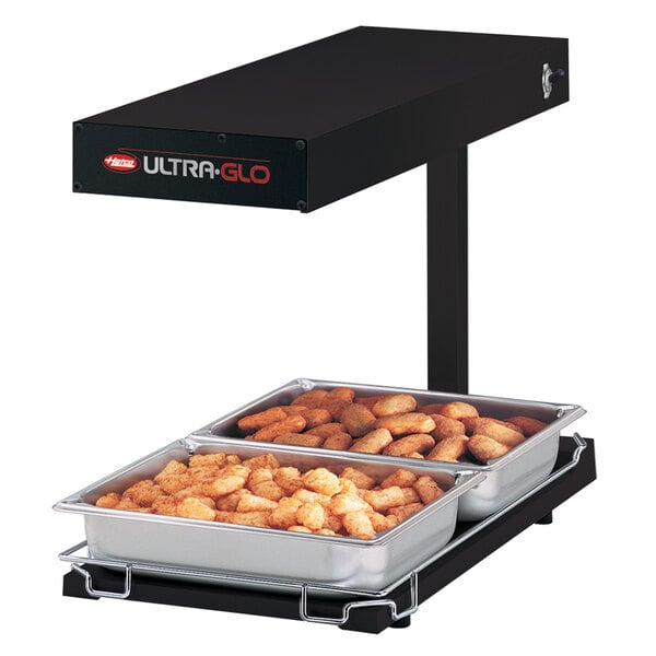 A black Hatco Ultra-Glo heated shelf with food on a tray.