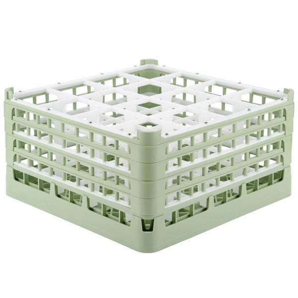 A light green Vollrath plastic glass rack with 16 compartments.