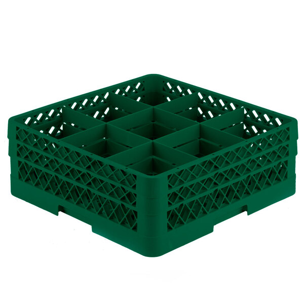 A green Vollrath plastic glass rack with six compartments.