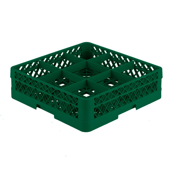 A green plastic Vollrath Traex glass rack with nine compartments.