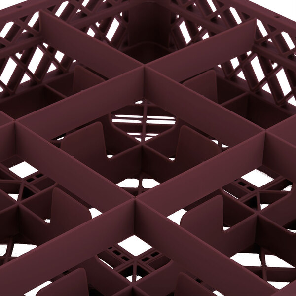 A close up of a red Vollrath Traex glass rack with a grid pattern.