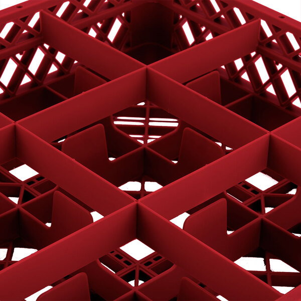 A red Vollrath Traex glass rack with 9 compartments.