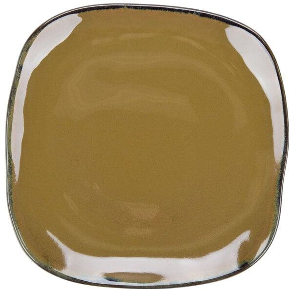 A brown square Tuxton china plate with a black rim.