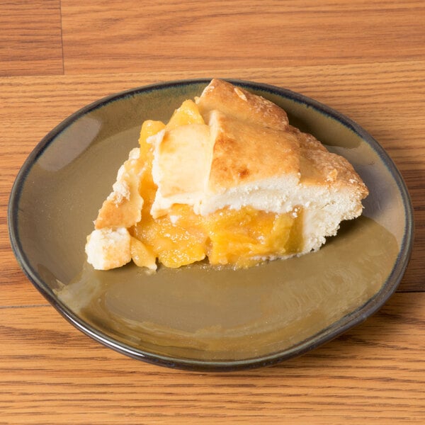A slice of pie on a Tuxton Artisan China plate.