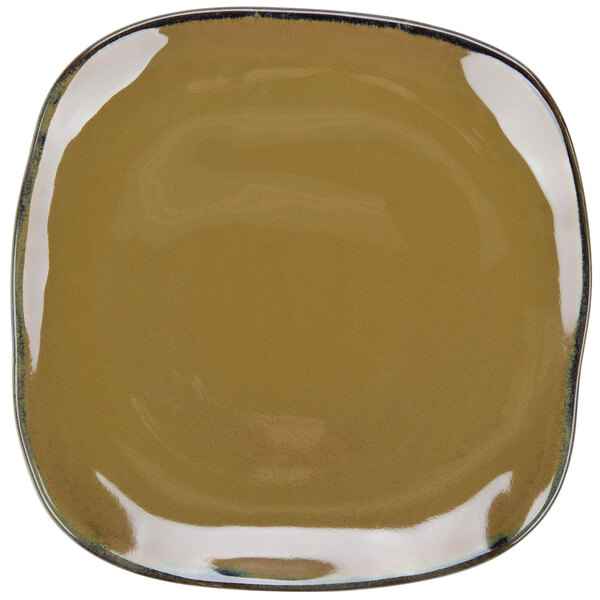 A brown square Tuxton Artisan china plate with a black rim.