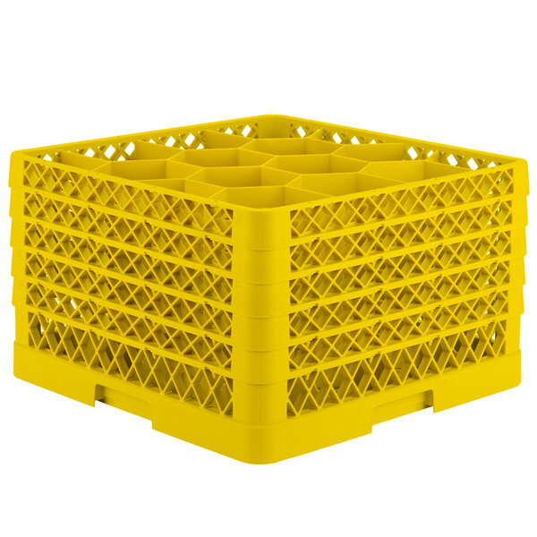 A yellow plastic Vollrath Traex glass rack with open extender on top and 12 compartments.