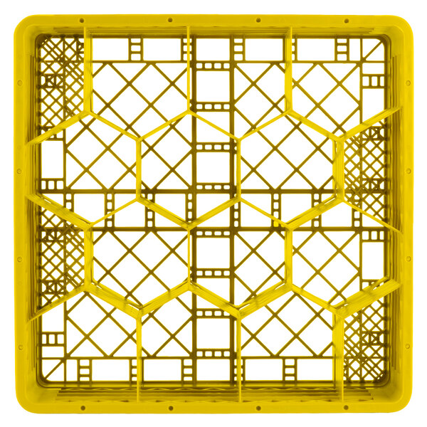 A yellow plastic Vollrath Traex rack with 12 hexagon compartments.
