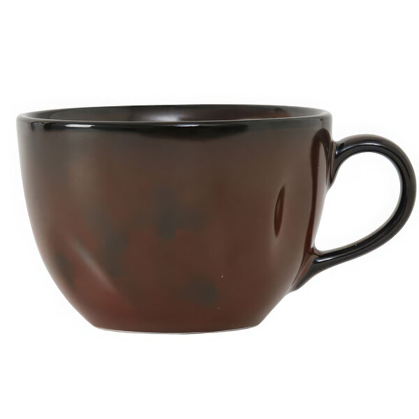 A brown Tuxton china cup with a handle.