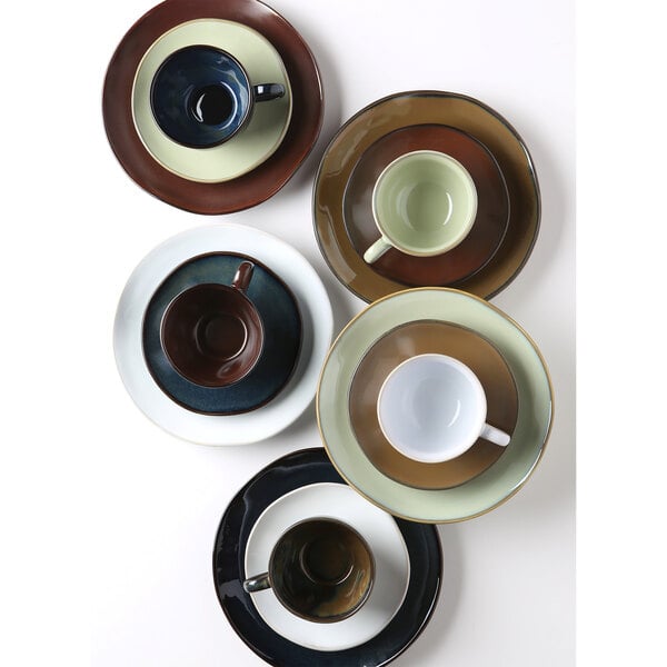 A brown Tuxton Mojave saucer with a cup on a plate.