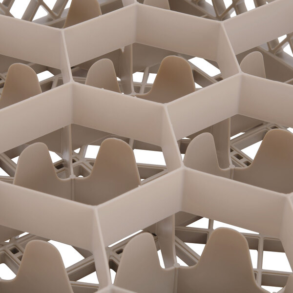 A beige plastic Vollrath Traex rack with open rack extender on top.