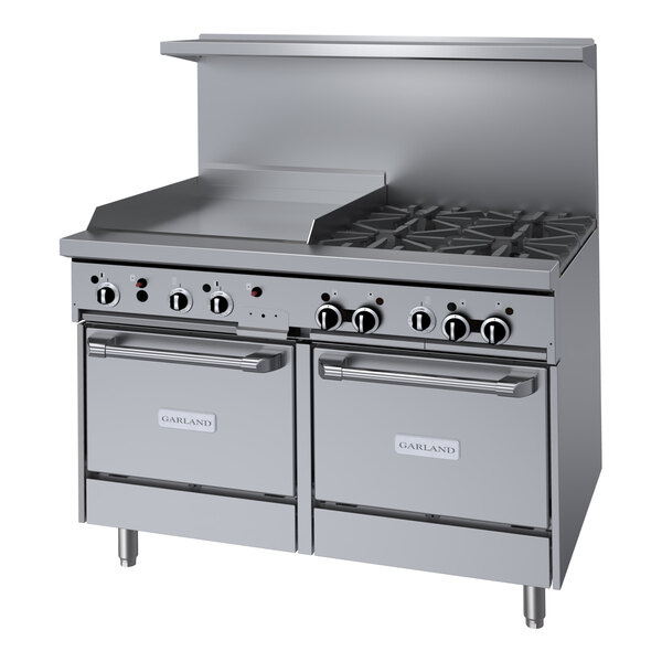 A stainless steel Garland commercial gas range with 4 burners, a griddle, and 2 ovens.