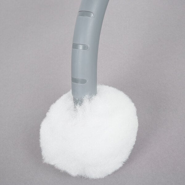 An Unger Ergo toilet bowl swab with a white cotton brush and gray handle.